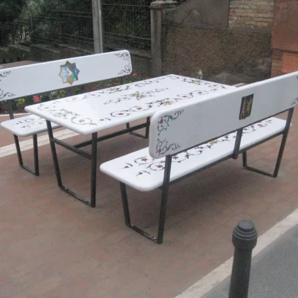 A lava stone set, table, and benches in blooming harmony design. Elevate urban decor with products that can withstand harsh weather conditions.