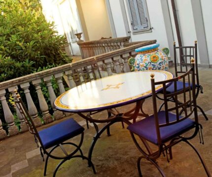 This lava stone table in classic design adds charm to your space.