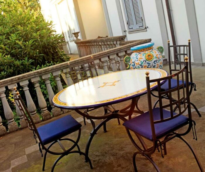 This lava stone table in classic design adds charm to your space.