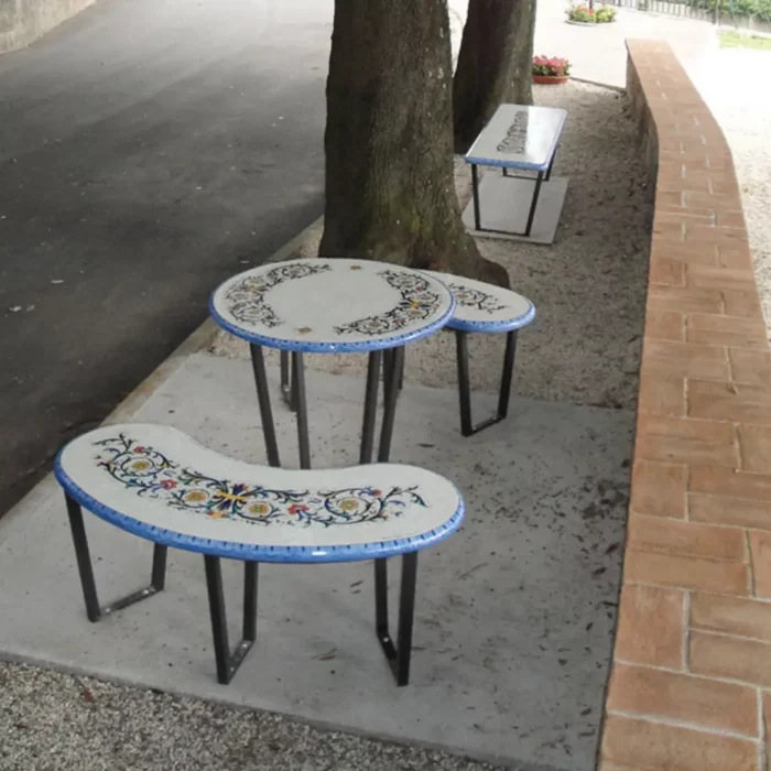 A lava stone set, table, and benches in floral serenity design. Not just elegant urban decor, but a place where beauty and durability merge seamlessly.