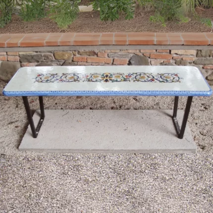 A lava stone bench decorated with light ornaments. Elevate urban decor with Elegantico lava stone benches!