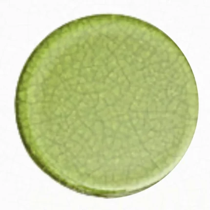 A mono-color lava stone table in verdant hues.