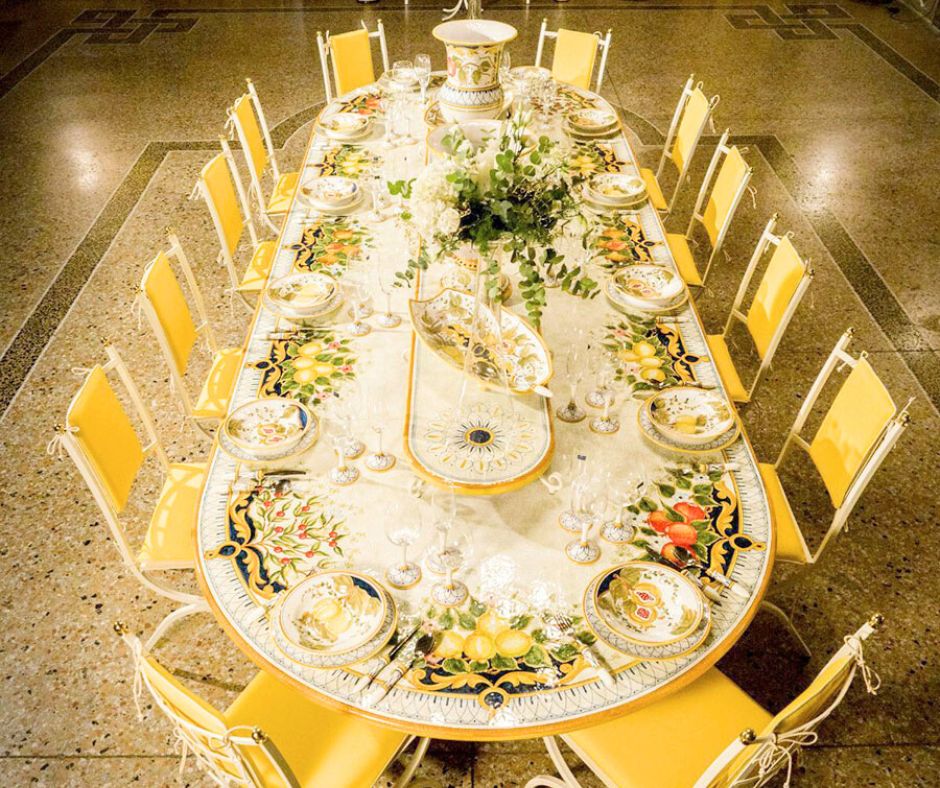A giant oval lava stone table made in Italy and hand-painted by our talented artists. Antique, elegant, eco-friendly, and made to last a lifetime.