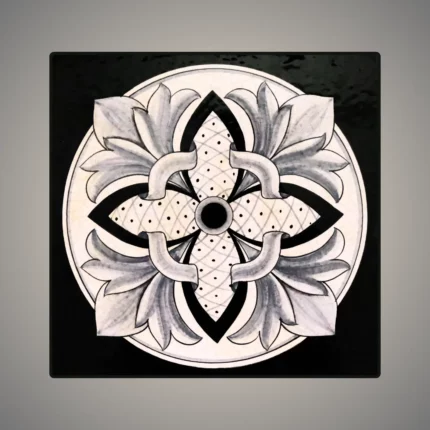 This is an enamel-glazed lava stone tile, hand-painted in Baroque Rossete design.